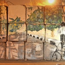 The "No Walls" Graffiti, Ammar Abo Bakr (Jonathan Rashad). Trompe-l'œil sur un mur érigé par les autorités égyptiennes, Rue Sheikh Rihan en mars 2012.
